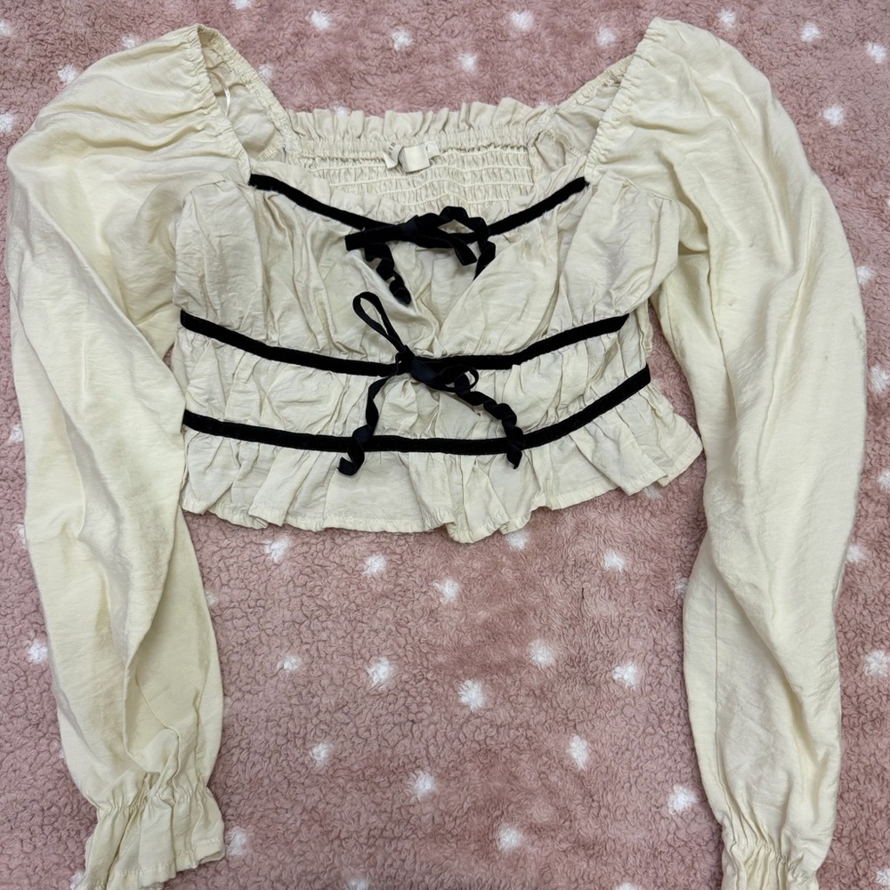 Chic Cream Blouse with Black Detailing